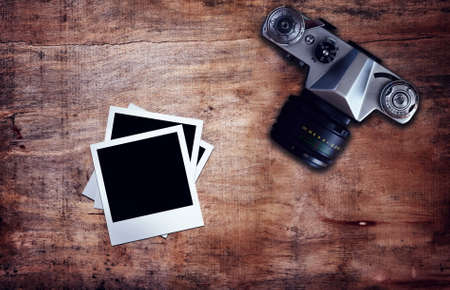 vintage camera with instant photoの写真素材