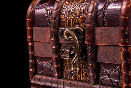 vintage treasure chest closeup on black
