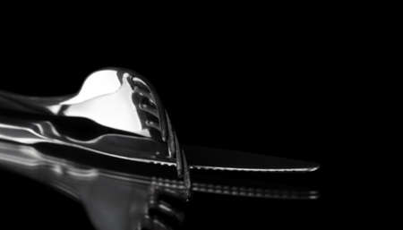 fork and knife on black,shallow DOFの写真素材