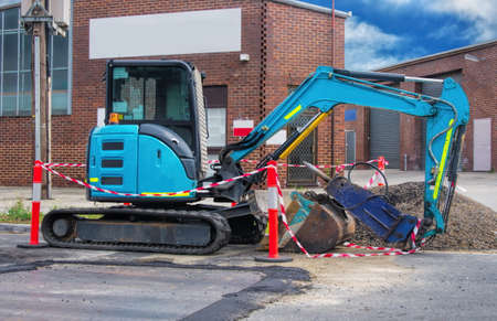 excavator at work closeupの写真素材