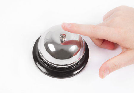 ring bell with the hand on white