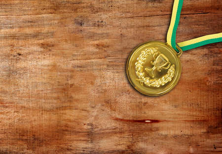 golden medal on the tableの写真素材