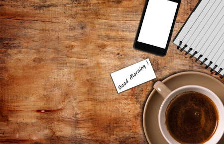 top view of coffe ,notepad with phoneの写真素材