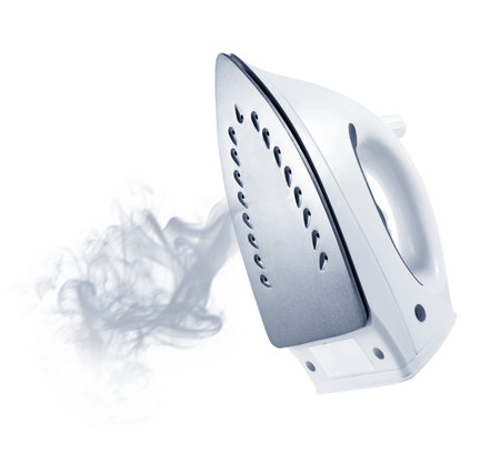 steam iron on the whiteの写真素材