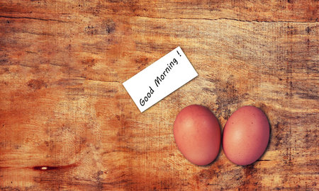 eggs on the wood table.top viewの写真素材
