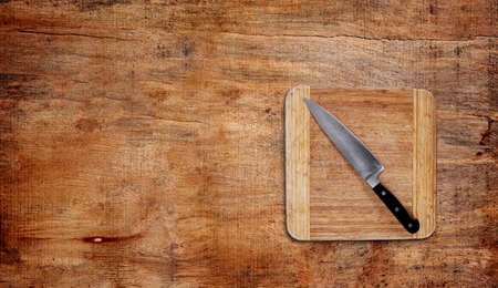 knife and board on table,top viewの写真素材