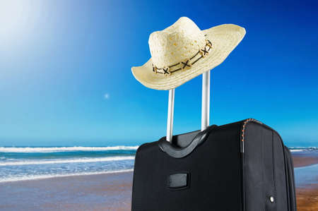 travel suitcase on the beachの写真素材