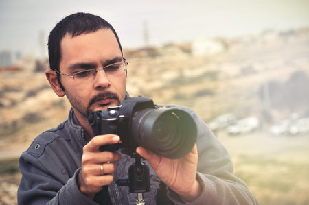 photographer at the work outoors