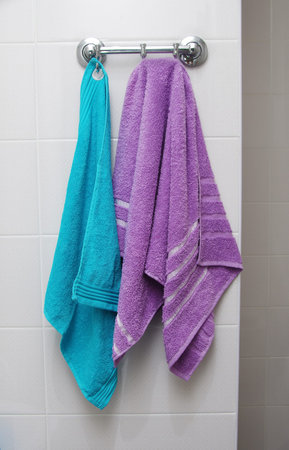 towels hanging in the bathroomの写真素材