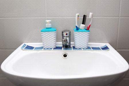 bathroom staff closeup water tap and hygiene objects