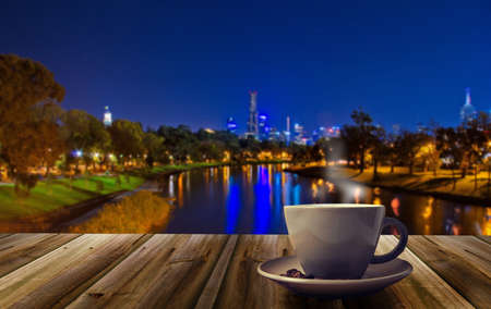 cup of coffee on the city backgroundの写真素材