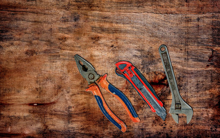 old and rusty tools on table