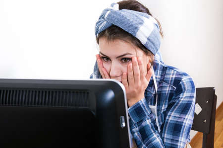 house wife using the computerの写真素材