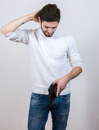 man putting with the empty walletの写真素材