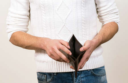 man putting with the empty walletの写真素材