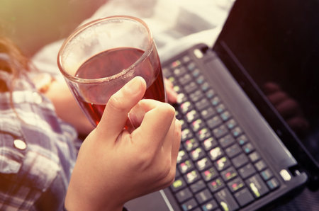 brunette girl with teaの写真素材