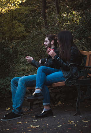 young couple in autumn park,shallow DOFの写真素材