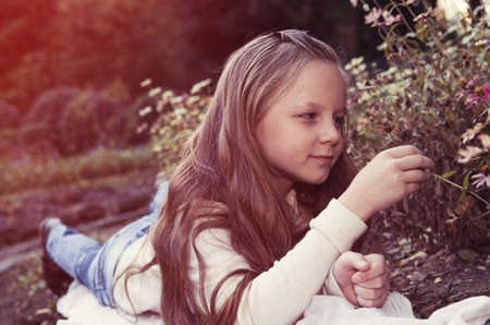 pretty girl portrait in the parkの写真素材