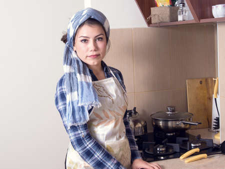 portrait of housewife in the kitchenの写真素材