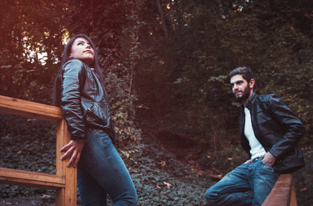 young couple in autumn park,shallow DOFの写真素材