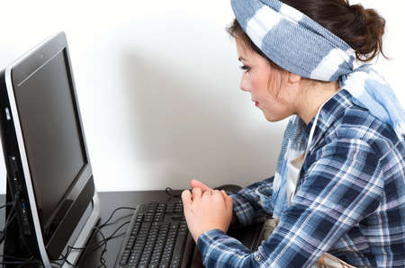 house wife using the computerの写真素材