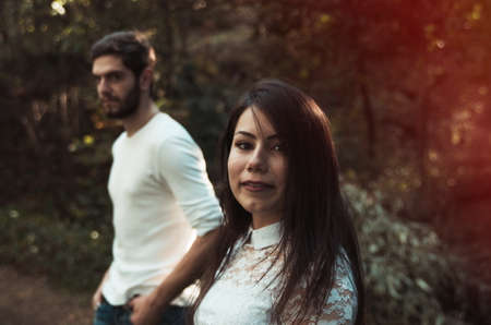 young couple in autumn park,shallow DOFの写真素材