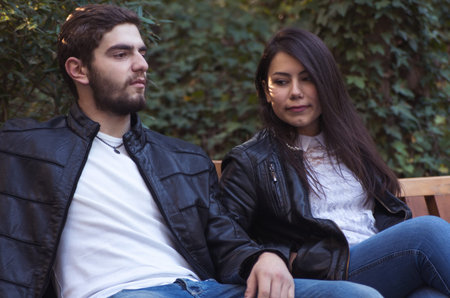 young couple in autumn park,shallow DOF