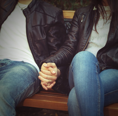hands of the young couple closeup