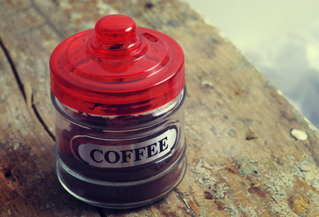 jar of the black coffee on tableの写真素材