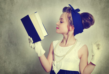 pretty girl with book portrait,retro styleの写真素材