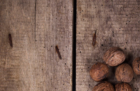 healthy nuts on the wood table.top view