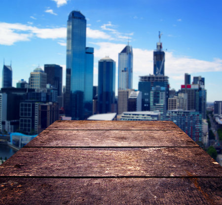 wood table surface and city