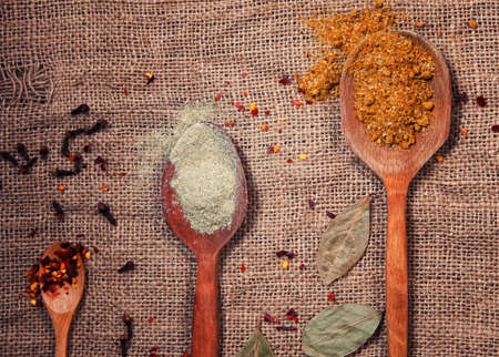 spices on the wooden spoonの写真素材