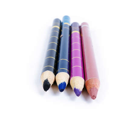colorful make up pencils on whiteの写真素材