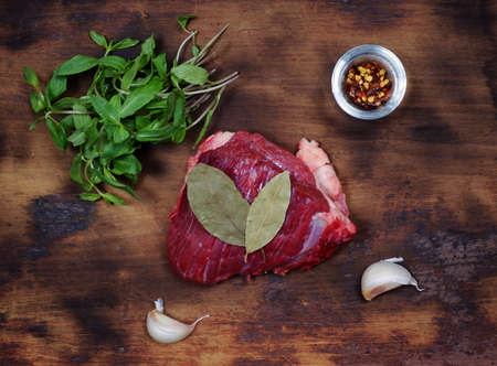 raw meat steak with ingredientsの写真素材
