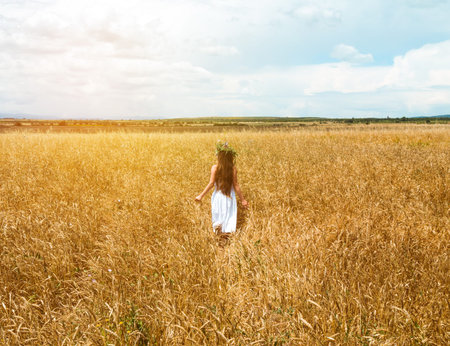 little girl in the wheat field