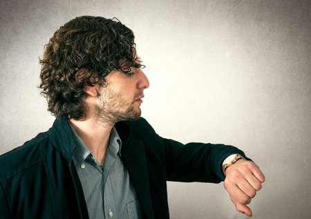 Man looking on the watch