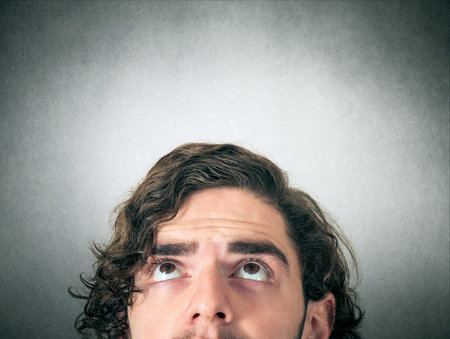 Handsome man has an ideaの写真素材