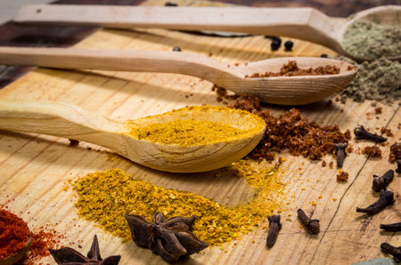 Spices on the wooden spoonsの写真素材