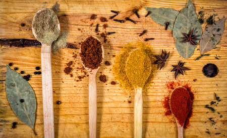 Spices on the wooden spoonsの写真素材