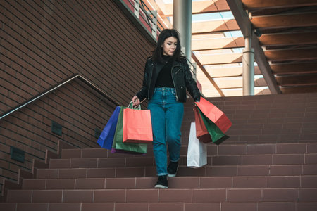 Happy girl making shoppingの写真素材