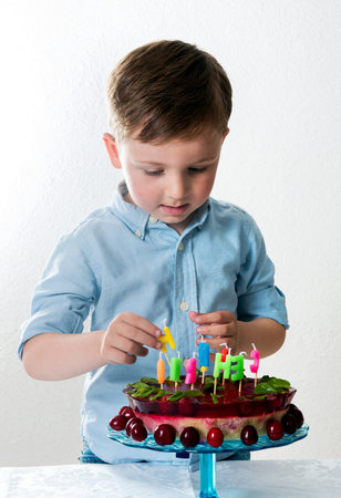Little boy with the birthday cake