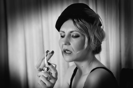 Vintage woman portrait with cigaretteの写真素材