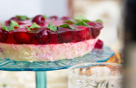 Birthday cake with cherries closeupの写真素材