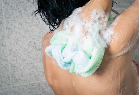 Woman closeup in the home showerの写真素材