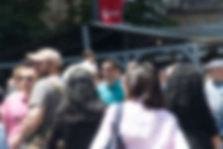 Blurred unfocused picture of people in streetの写真素材