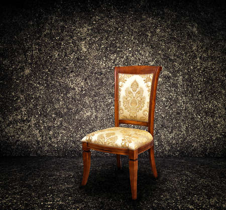 Vintage chair on dark backgroundの写真素材
