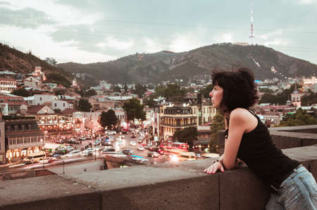 Woman with the view on Tbilisi, Georgiaの写真素材