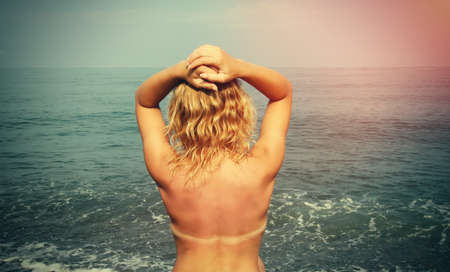Pretty woman on the beachの写真素材
