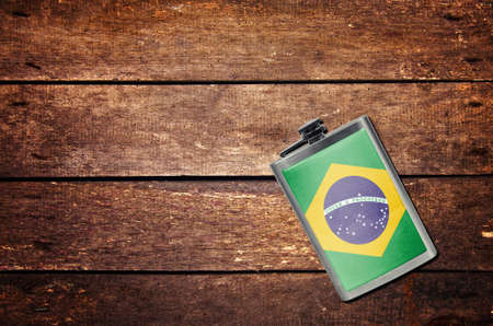 Alcohol flask on the table with flag,の写真素材